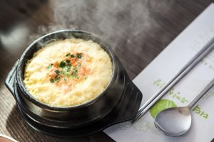 Egg soup with pasta and cheese